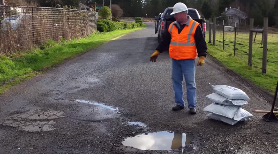 impossibly-wet-conditios-pothole-repair