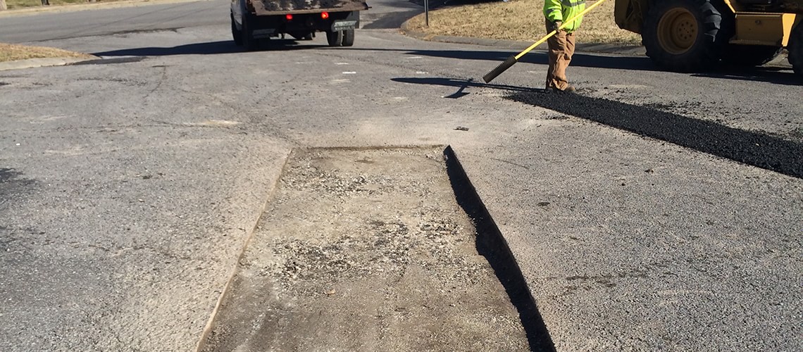 Music City. The Grand Ole Opry. Titans football. And…green asphalt for utility cut repairs?