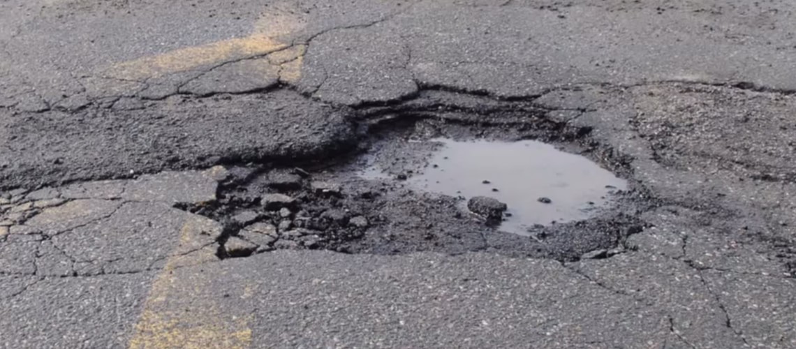 Water Filled Pothole – Vancouver
